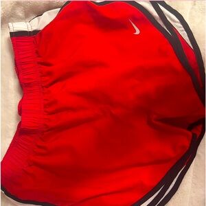 red nike shorts